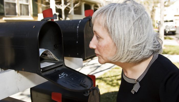 lady checking mailbox